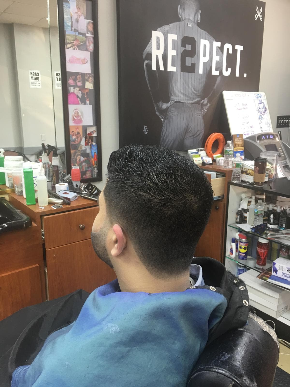 Back view of a classic tapered haircut with a smooth low fade